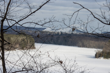 Fototapeta premium A factory in the distance in the winter