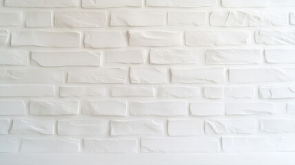 Fototapeta premium Clean white brick wall texture, ideal for backgrounds in modern architectural design or minimalistic interior spaces.