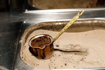 State of Qatar. Doha. Traditional Middle East, Arab coffee making.
