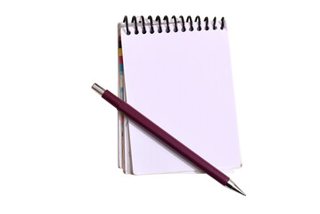 notepad with a pen on the table in aerial view with space for text