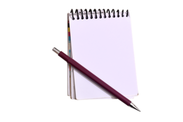 notepad with a pen on the table in aerial view with space for text