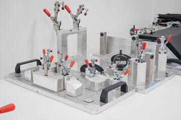 Metal manufacturing jig used in industrial production with gauges and clamps Precision engineering