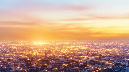 Naklejka premium Golden Hour Cityscape: A Panoramic View of Urban Lights at Sunset