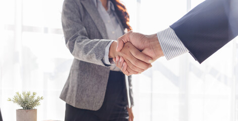 Business handshake for teamwork of business merger and acquisition,successful negotiate,hand...
