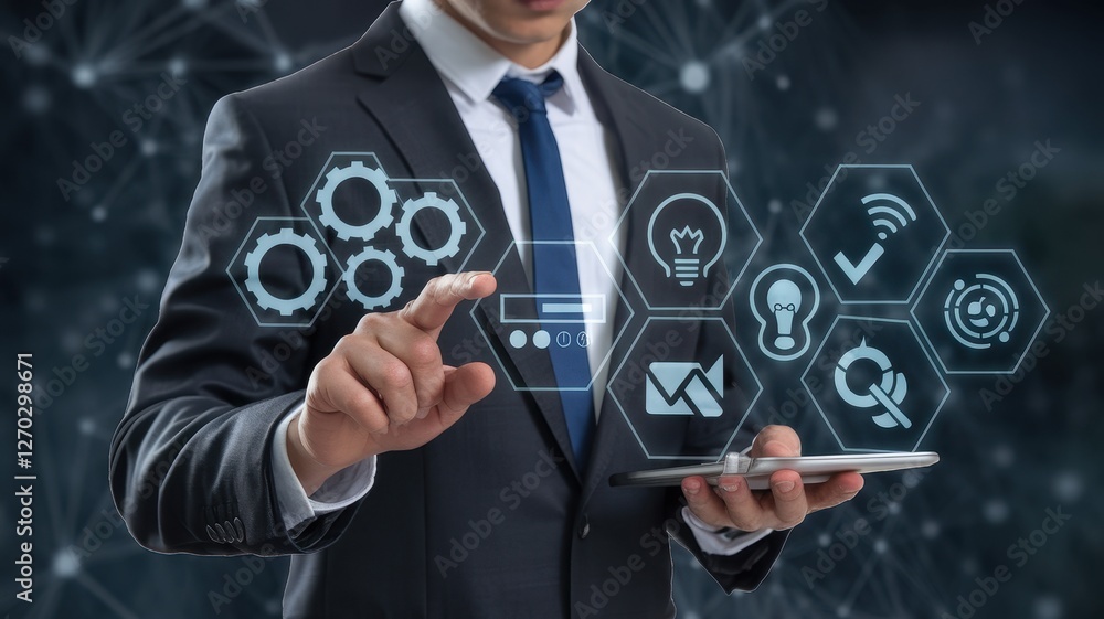 Poster businessman using a tablet to access various digital applications