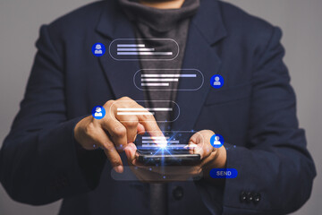 Close-up of hands texting on smartphone with holographic chat interface for social media and messaging.