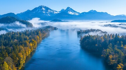 Fototapeta premium Serene river flowing through misty mountains nature scene aerial view tranquil environment stunning landscape