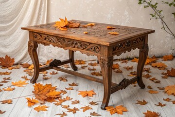 A beautifully crafted wooden table with an ornate design placed on a soft muted background with scattered orange autumn leaves, ornate furniture, subtle background, wooden tables