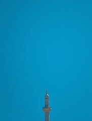 Mosque Minaret Tower Reaching Into Clear Blue Sky Simple Architectural View
