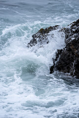 waves crashing on rocks