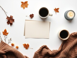 Autumn-themed feminine desk with brown scarf, paper card, coffee cup, candles, Nordic hygge, cozy home concept, paper card, autumn, hygge