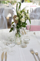 Festively set table at a wedding reception 