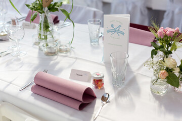 Festively set table at a wedding reception 