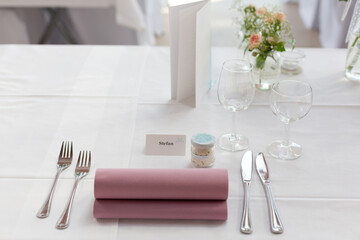 Festively set table at a wedding reception 