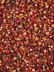 Sichuan pepper.closeup of Chinese pepper (Zanthoxylum schinifolium) background. 