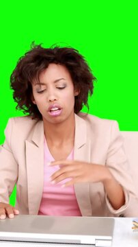 Businesswoman feeling stressed at her desk