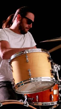 Drummer playing his drum kit