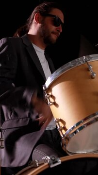Drummer playing his drum kit