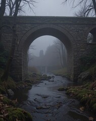 An old stone bridge stretches over a misty river, with soft light filtering through the fog
