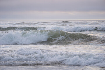 waves breaking on the beach