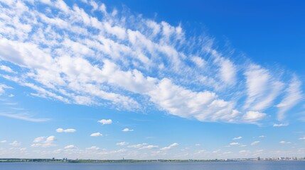 Obraz premium photo blue sky wispy clouds