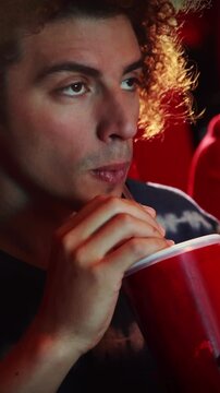 Young man watching a movie