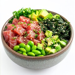 A vibrant and colorful poke bowl with fresh tuna, avocado, edamame