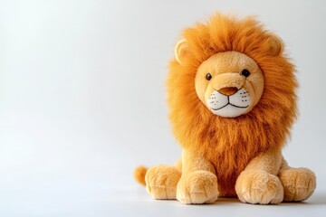 Toy lion with a large, fluffy mane on pure white background