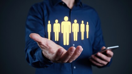 Man holding glowing digital figures representing teamwork and leadership