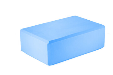 Blue polypropylene yoga block isolated on white background. Sports and health products.