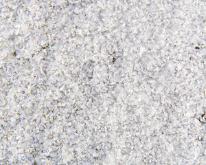 Grainy snow texture. Frost and ice crystals.