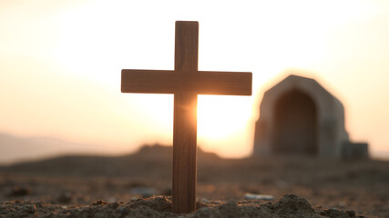 A simple, elegant wooden cross at the forefront of a soft, golden sunrise, with the blurred silhouette of an empty tomb behind, symbolizing the resurrection of Christ and the hope of new life.
