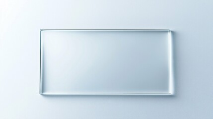 A glass microscope slide positioned on a white background, exemplifying scientific clarity and precision, perfect for educational and laboratory visuals on microscopy.