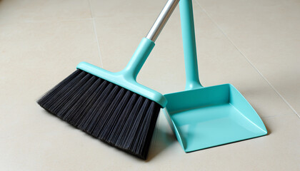 Blue Broom and Dustpan Set on a Clean Tile Floor