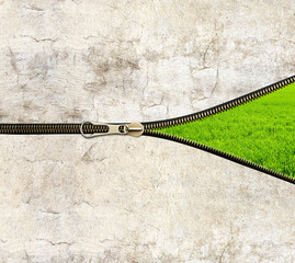 New city life concept. Concrete wall, zipper opened and green grass. Unzipped zipper or fastener....