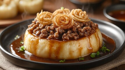 A delicious serving of savory meat atop a fluffy base, garnished with crispy spirals.