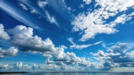 Uncommon Cloud Formations in a Vast Blue Sky - Panoramic Landscape Photography of Unique Atmospheric Patterns and Expansive Horizon