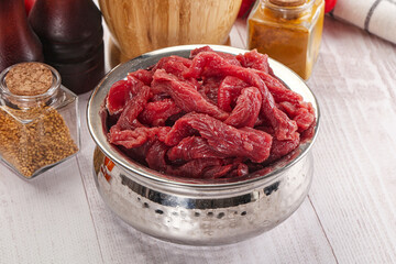 Raw beef meat - sliced strips
