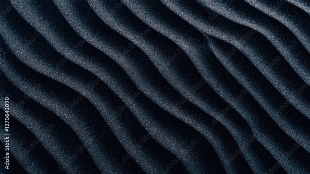 Poster a close-up of textured material featuring dark, wavy patterns, creating an intriguing visual depth a