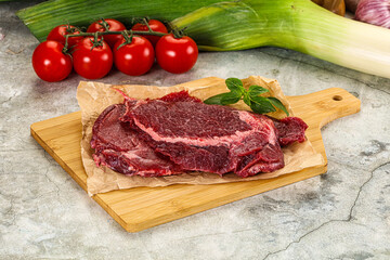 Raw beef cheeks cut for cooking