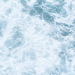 Obraz premium Foaming Ocean Waves Crashing on the Sea Surface with Intense Agitation and Swirling Textures of White Water