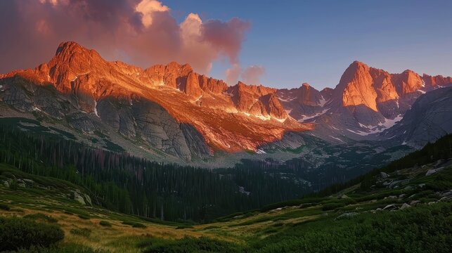 Majestic mountains bathed in warm sunset light