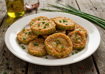 fried zucchini on a plate, healthy food concept . Generative AI