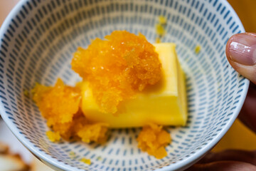 minced garlic on the butter