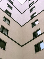 internal corner of the building, wall with windows, dead end, multi-story building modern...
