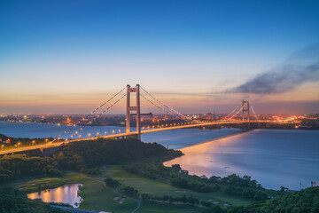 Jiangyin Yangtze River Bridge and Yangtze River and Urban Scenery in Jiangsu Province, China on August 6, 203