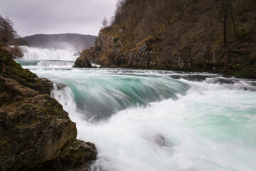 Waterfall and cascade on Una river, water sprays and flows in motion blur, turquoise colour