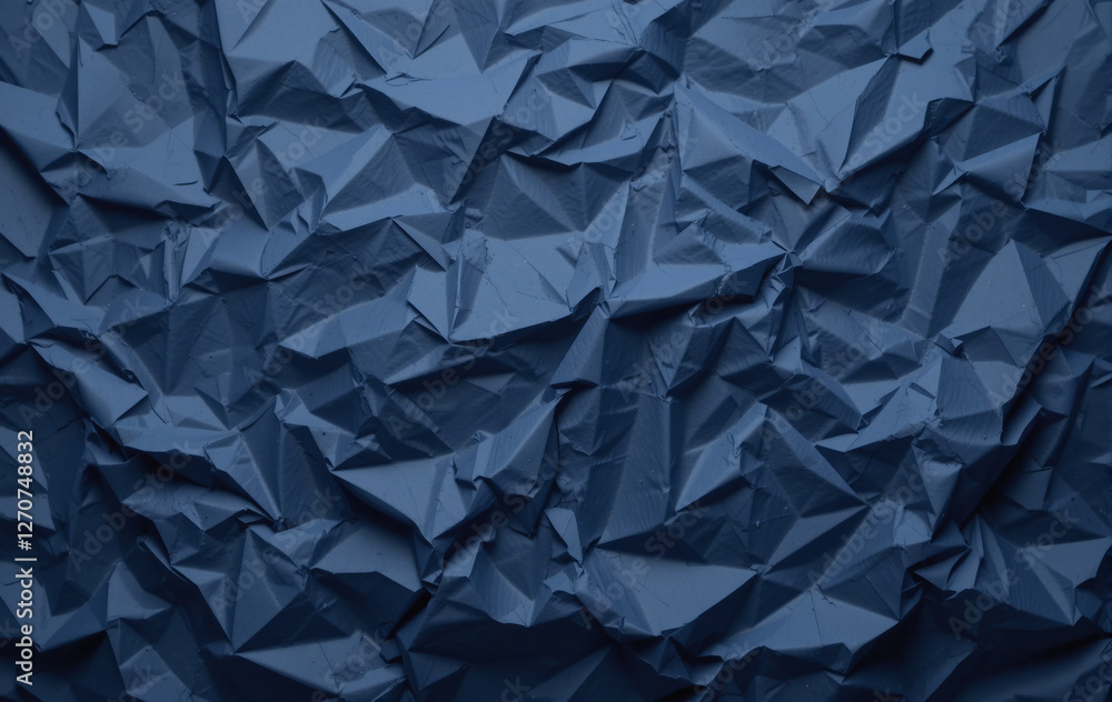Poster deep blue crumpled paper with a textured surface, creating a rich, abstract pattern.
