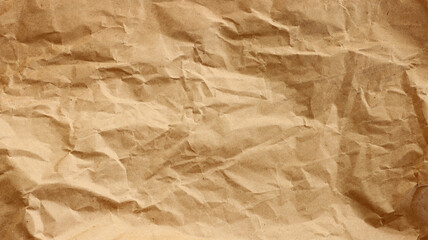 Background of crumpled brown recycled paper