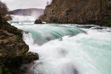 Waterfall and cascade on Una river, water sprays and flows in motion blur, turquoise colour